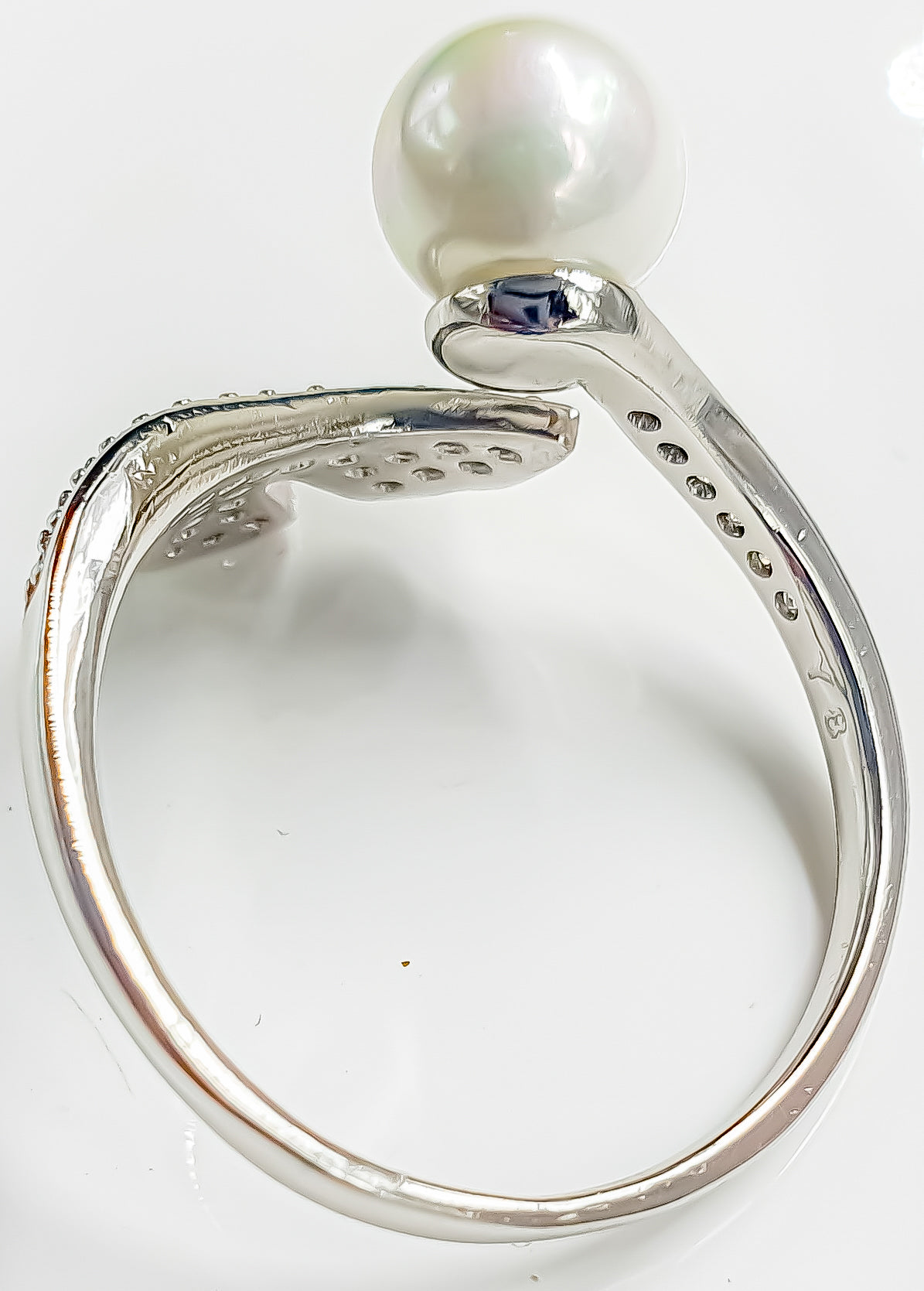 Raani's Sterling Swirl Ring: Timeless Elegance, Enduring Sparkle