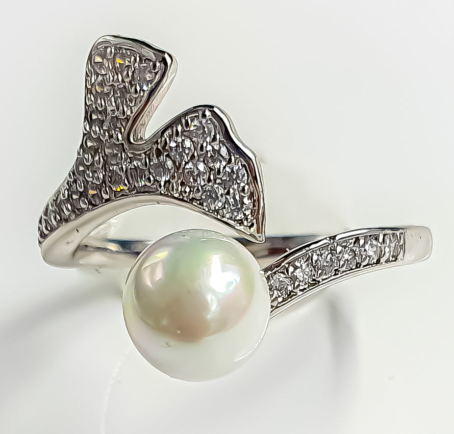 Raani's Sterling Swirl Ring: Timeless Elegance, Enduring Sparkle