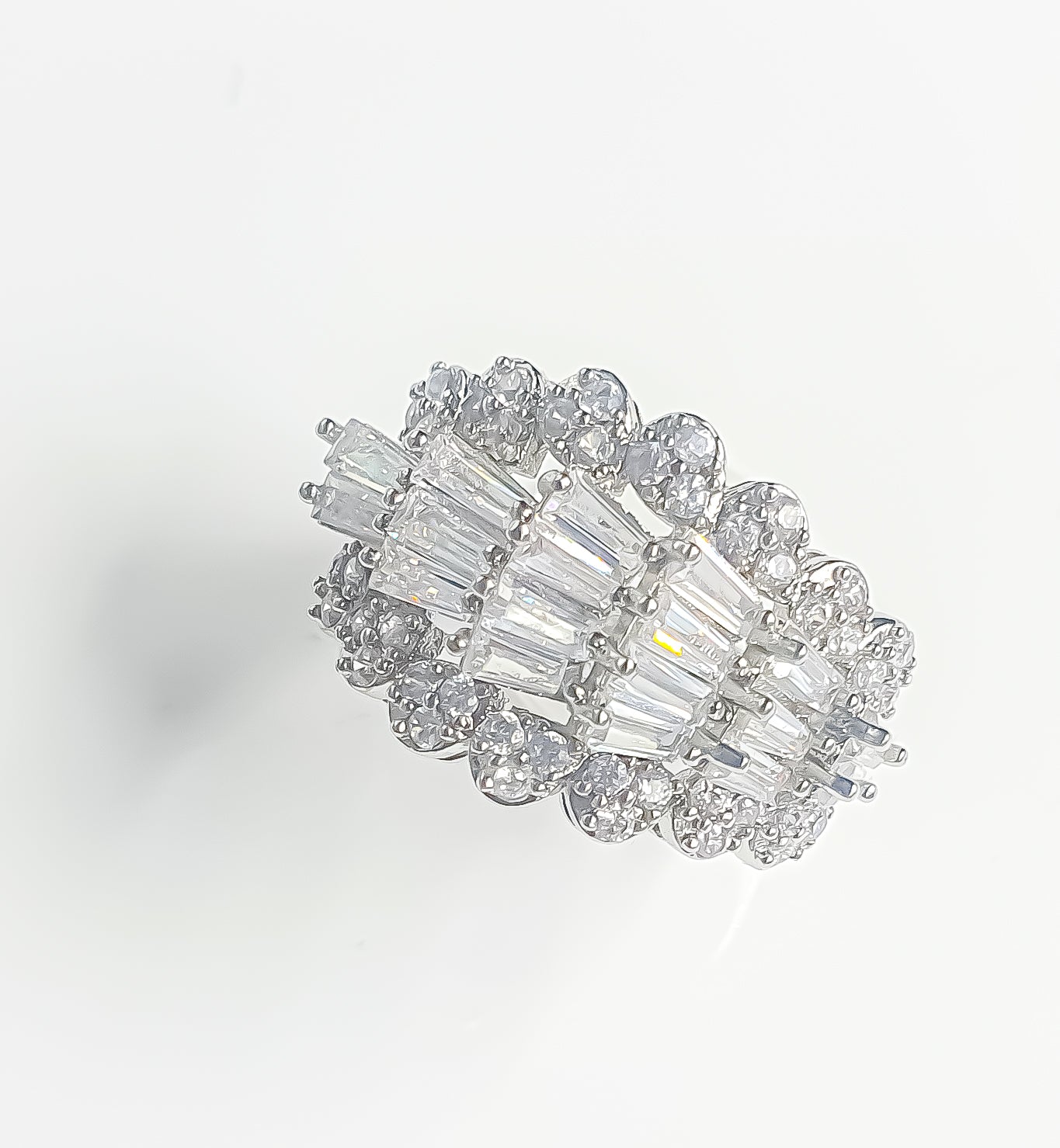 Introducing Raani's Sparkling Eternity Ring, a Cubic zirconia art deco statement ring. This beautiful piece offers everyday sparkle that lasts for an eternity. The timeless design suits any occasion, adding a touch of elegance to every look.