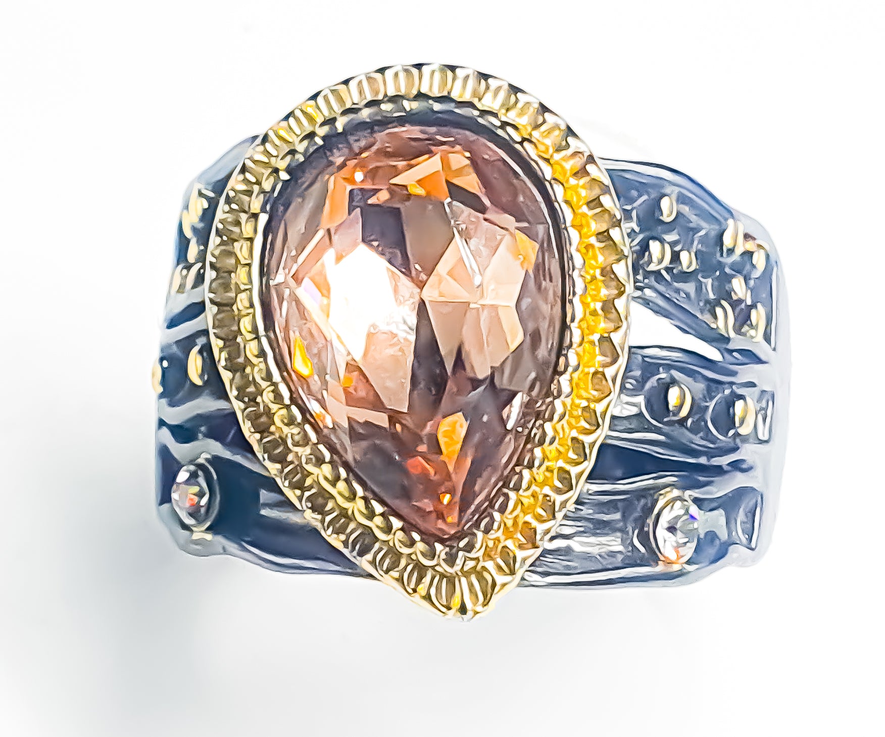 Embody timeless elegance with this black and amber colour statement ring. Raani's Rich Amber Ring features a warm-toned amber-coloured centrepiece that mesmerises with its rich hue. Surrounding the centrepiece, lustrous cubic zirconia adds a touch of brilliance, creating a luxurious and sophisticated look.