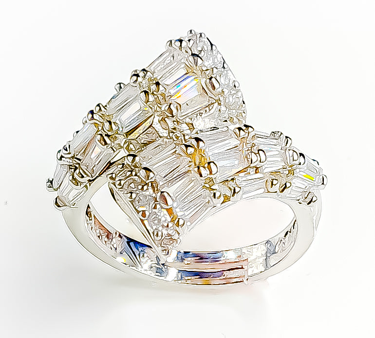 Introducing Raani's Radiant Dawn Statement Ring, a titanium steel cubic zirconia statement ring that embodies elegance and strength. This exquisite piece features a dazzling array of cubic zirconia stones set in durable titanium steel. The intricate design showcases the brilliance of each stone, creating a stunning visual impact.