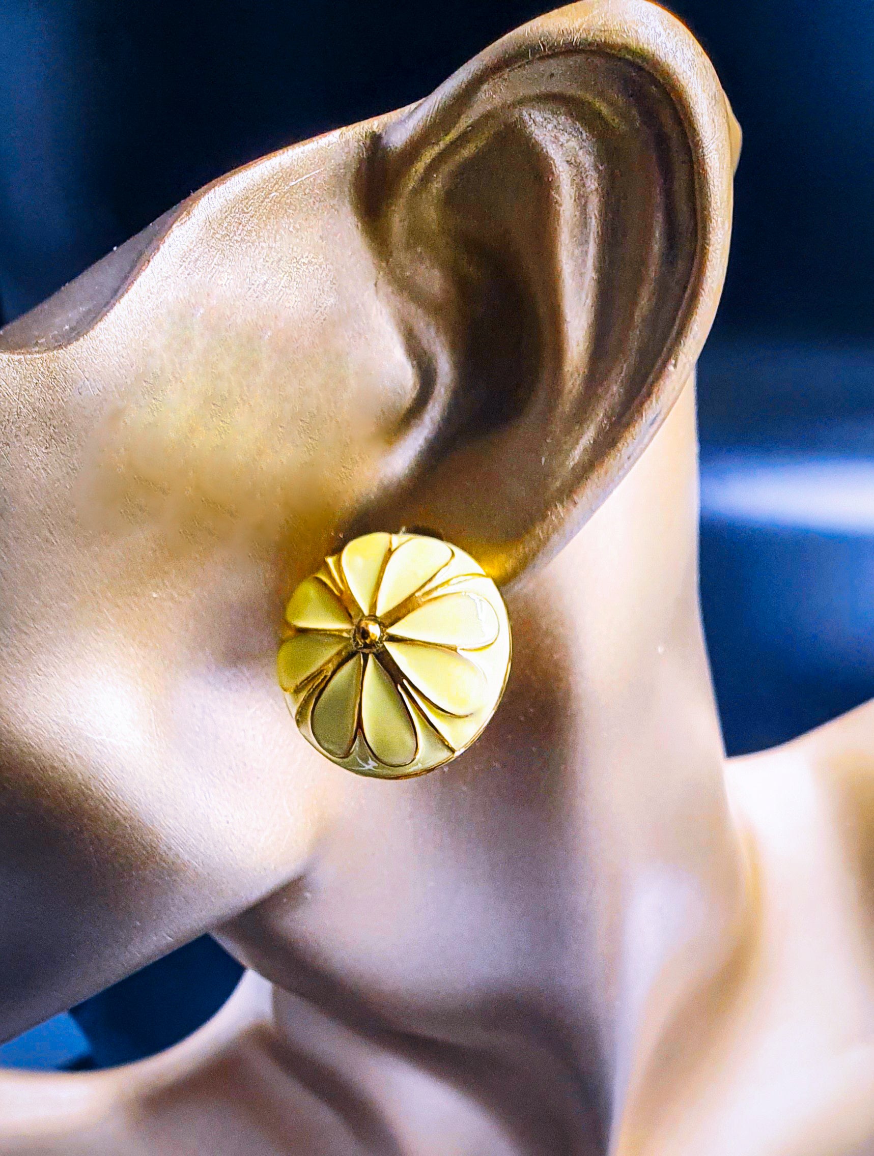 Bring a ray of sunshine wherever you go with yellow light-weight studs for daily wear. These charming earrings feature a subtle yellow lacquer coating over hypoallergenic, lightweight gold-finish metal. Their bright hue adds a touch of cheerfulness to any outfit, making them ideal for everyday use.