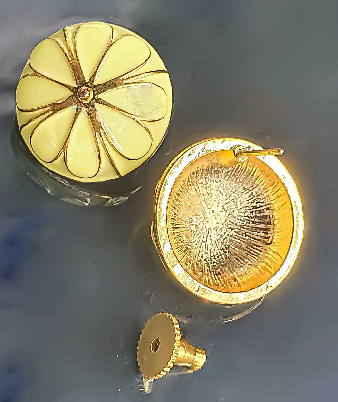 Bring a ray of sunshine wherever you go with yellow light-weight studs for daily wear. These charming earrings feature a subtle yellow lacquer coating over hypoallergenic, lightweight gold-finish metal. Their bright hue adds a touch of cheerfulness to any outfit, making them ideal for everyday use.