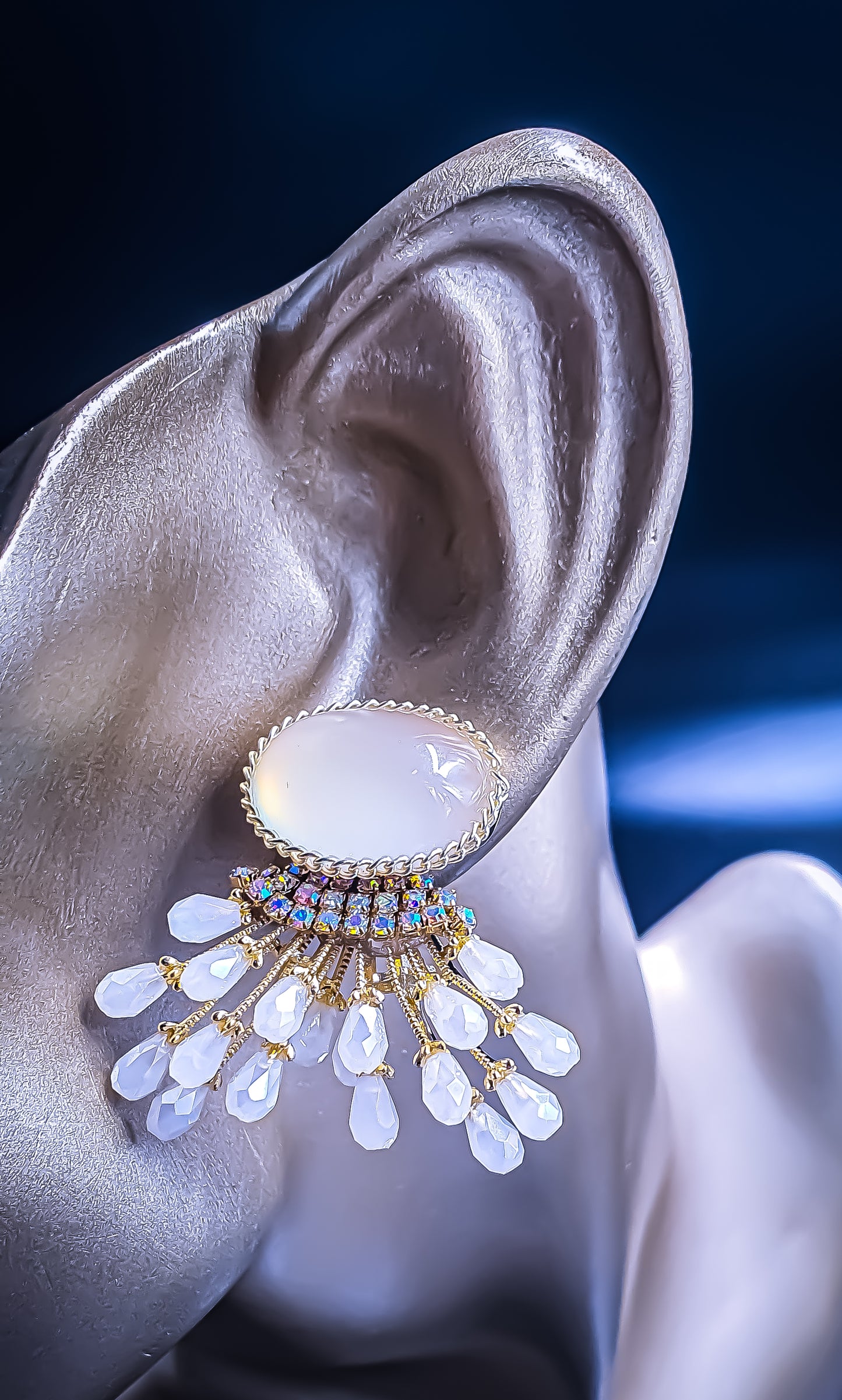 Introducing Raani's White Light Earrings, the perfect light weight earrings for daily wear. Designed for all-day comfort, these earrings feature a cascade of sparkling American Diamonds set in a gleaming gold-finish metal alloy. The sophisticated double-drop design ensures you turn heads wherever you go.