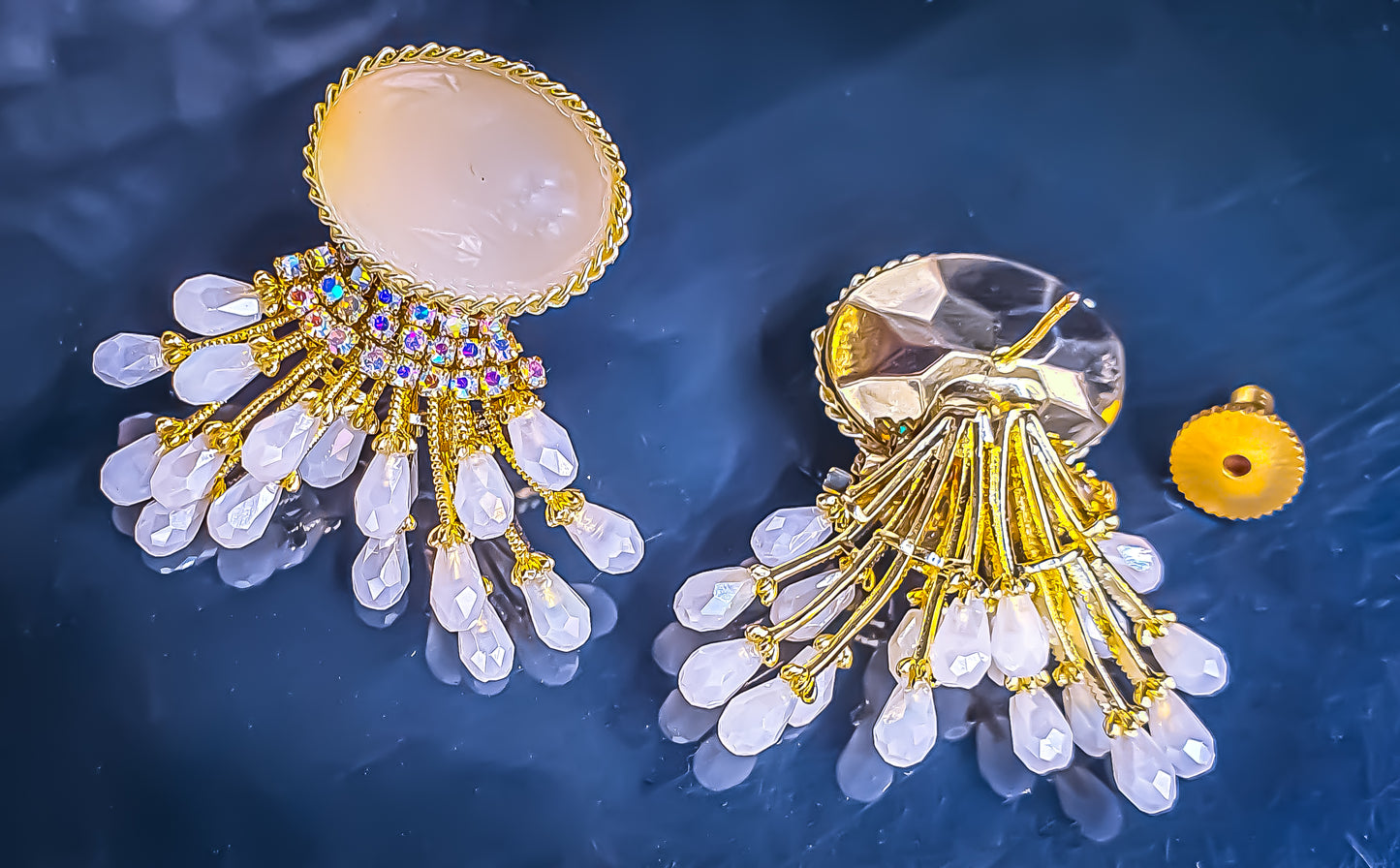 Introducing Raani's White Light Earrings, the perfect light weight earrings for daily wear. Designed for all-day comfort, these earrings feature a cascade of sparkling American Diamonds set in a gleaming gold-finish metal alloy. The sophisticated double-drop design ensures you turn heads wherever you go.