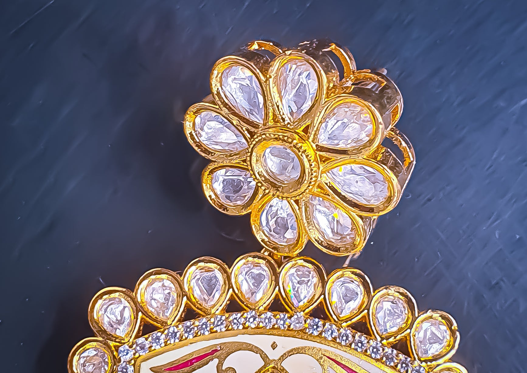 Introducing Raani's Ethnic Indian designer earrings with Kundan, pearls and cubic zirconia that are perfect for any special occasion. Aptly called Raani's Maya Earrings, these elegant earrings feature a gold-plated square design with intricate detailing, showcasing the beauty of traditional craftsmanship.