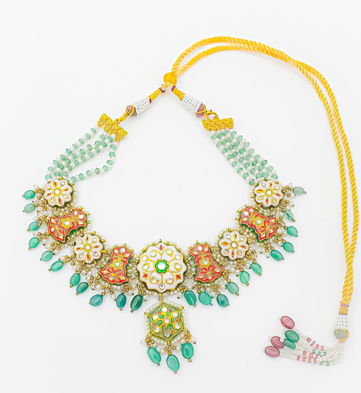 Introducing Raani's Rajasthani Tarangini Necklace Set, an Ethnic Rajasthani Necklace Set with Pearls.&nbsp; This set embodies the vibrant spirit and rich cultural heritage of Rajasthan. This enchanting ensemble captures the essence of Rajasthani folklore and traditional dance forms, exuding grace, charm, and timeless elegance.