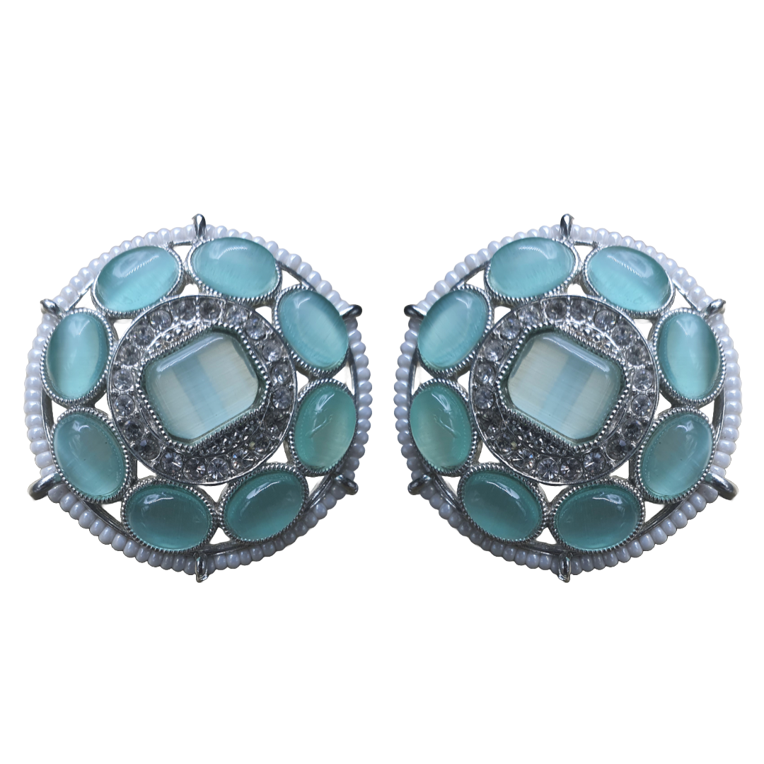 Introducing Raani's Rajmahal Earrings, handcrafted vibrant turquoise and white studs that bring timeless elegance to your look.