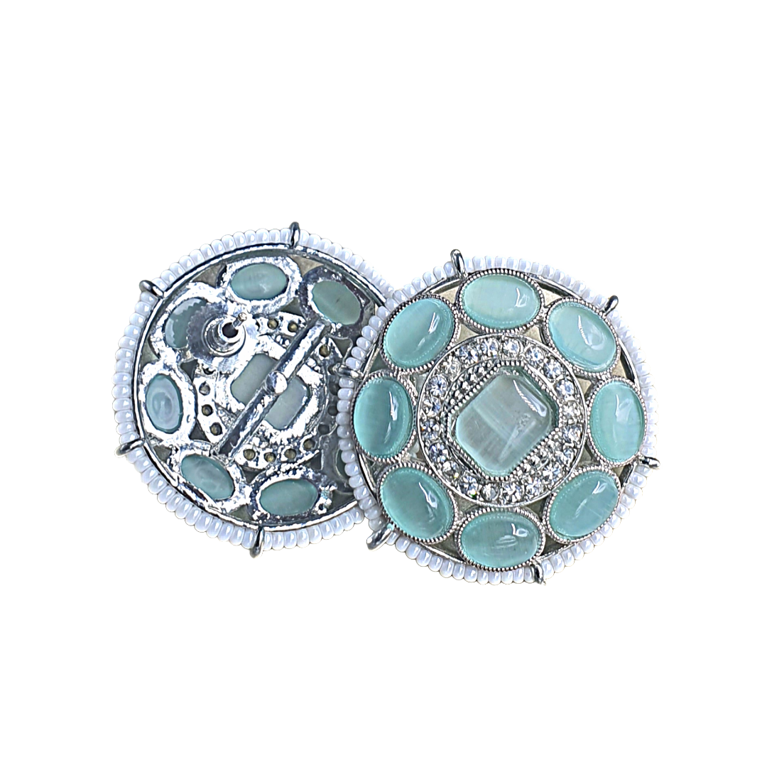 Introducing Raani's Rajmahal Earrings, handcrafted vibrant turquoise and white studs that bring timeless elegance to your look.